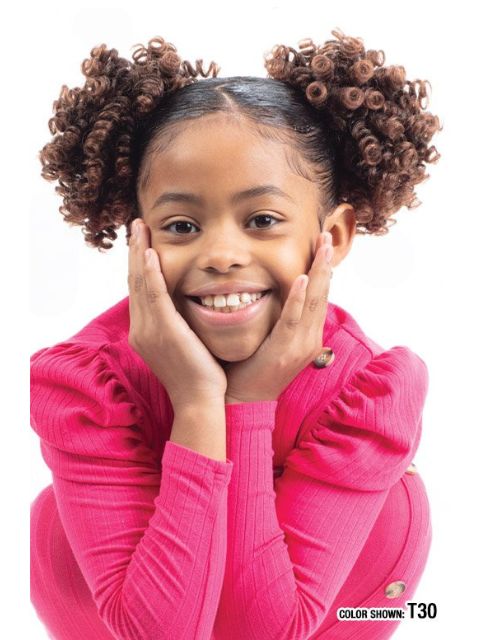 A model with coily hair styled in a high puff, showcasing a deep purple color